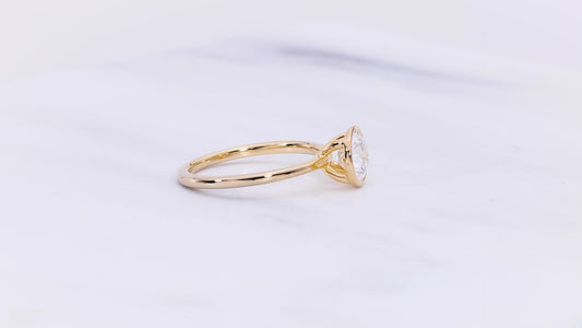 Mercer VOW by Ring Concierge  round bezel engagement ring in yellow gold. 